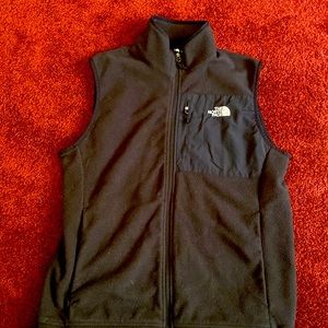 Black north face fleece vest. Lightly used.